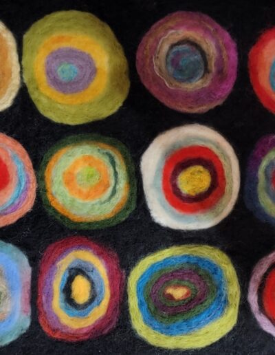 Klee Circles | 14x18 | Needle felted wool mounted for hanging | $250